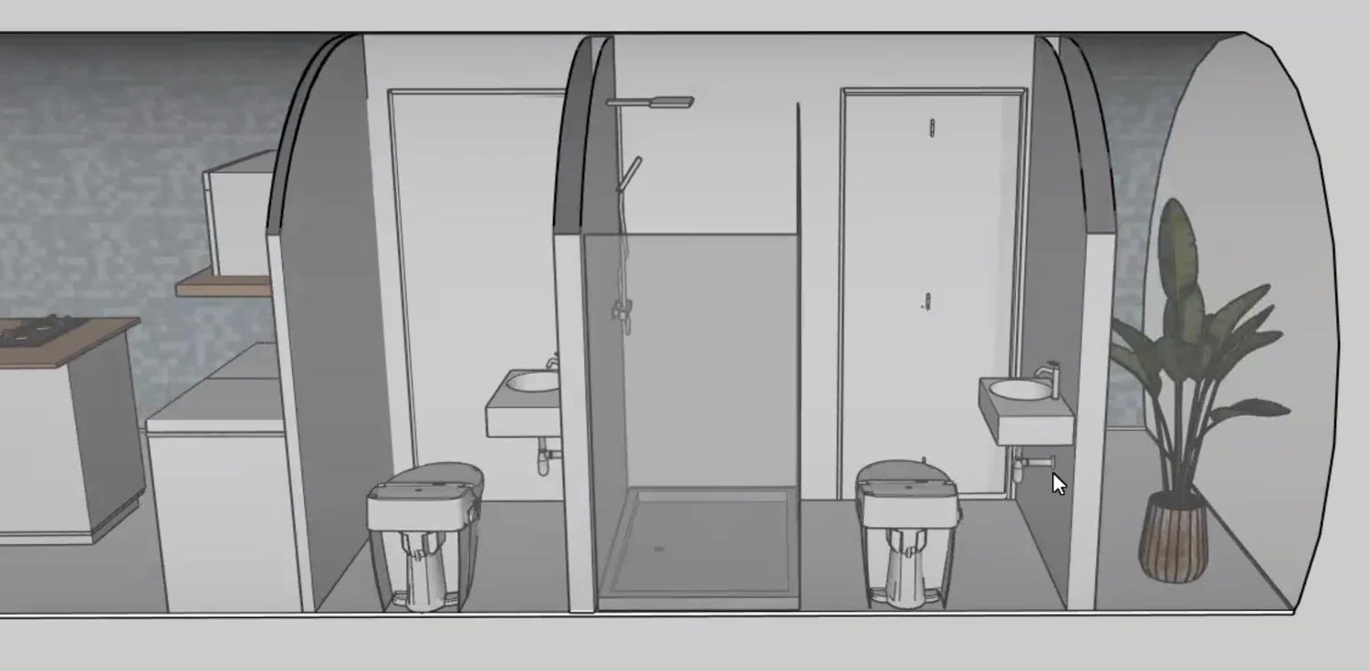 Model section through toilets, shower and hand basins.